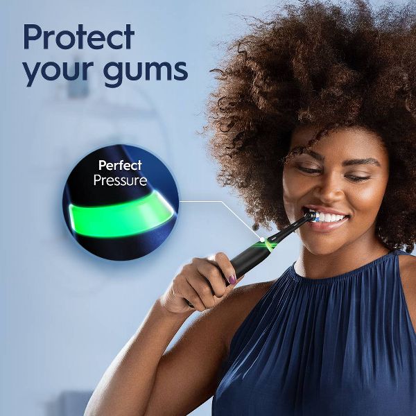 Oral-B Electric Toothbrush and Charger + 2 Count Brush Head Replacements